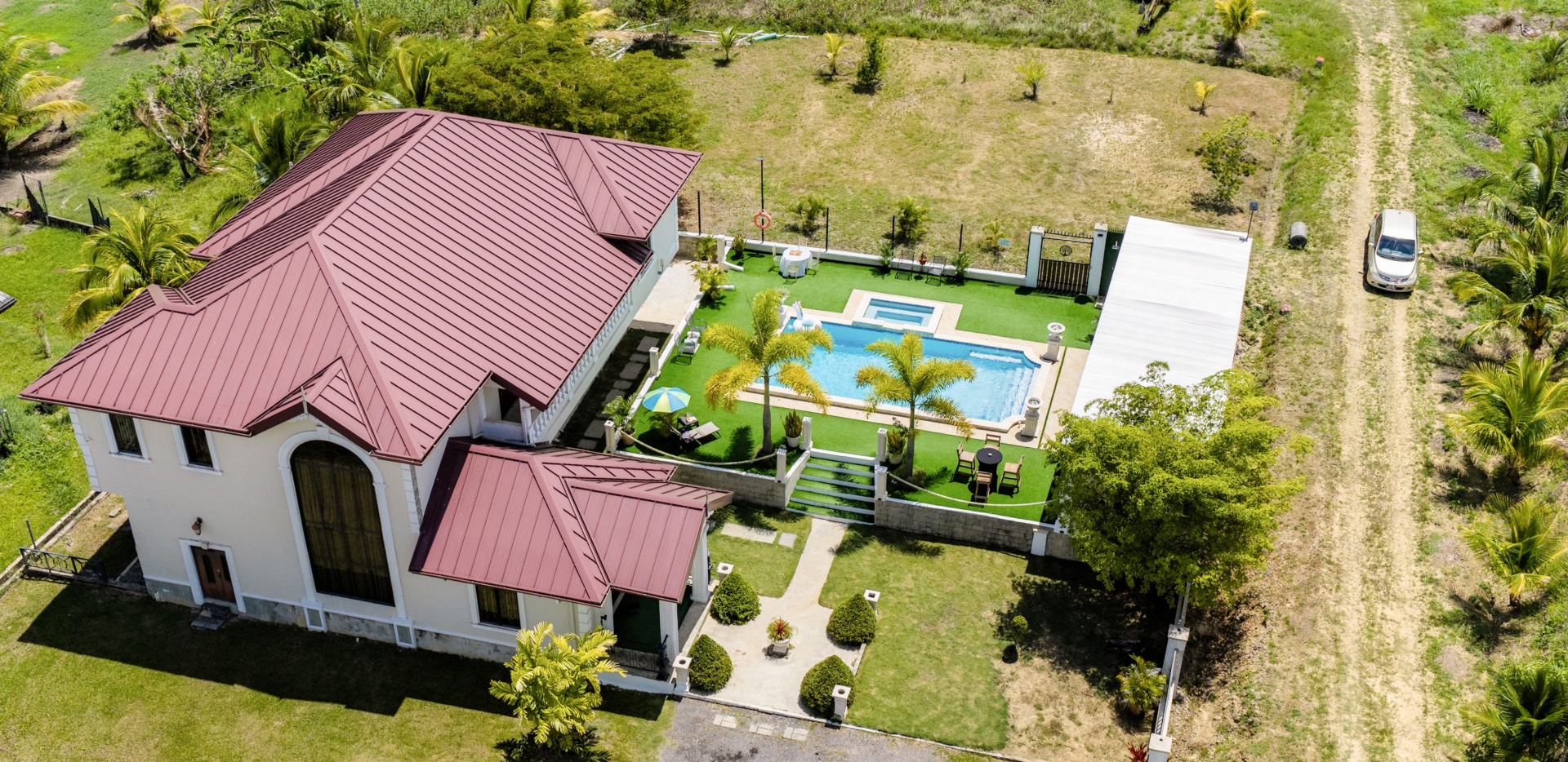 Aerial view of the villa, pool and grounds