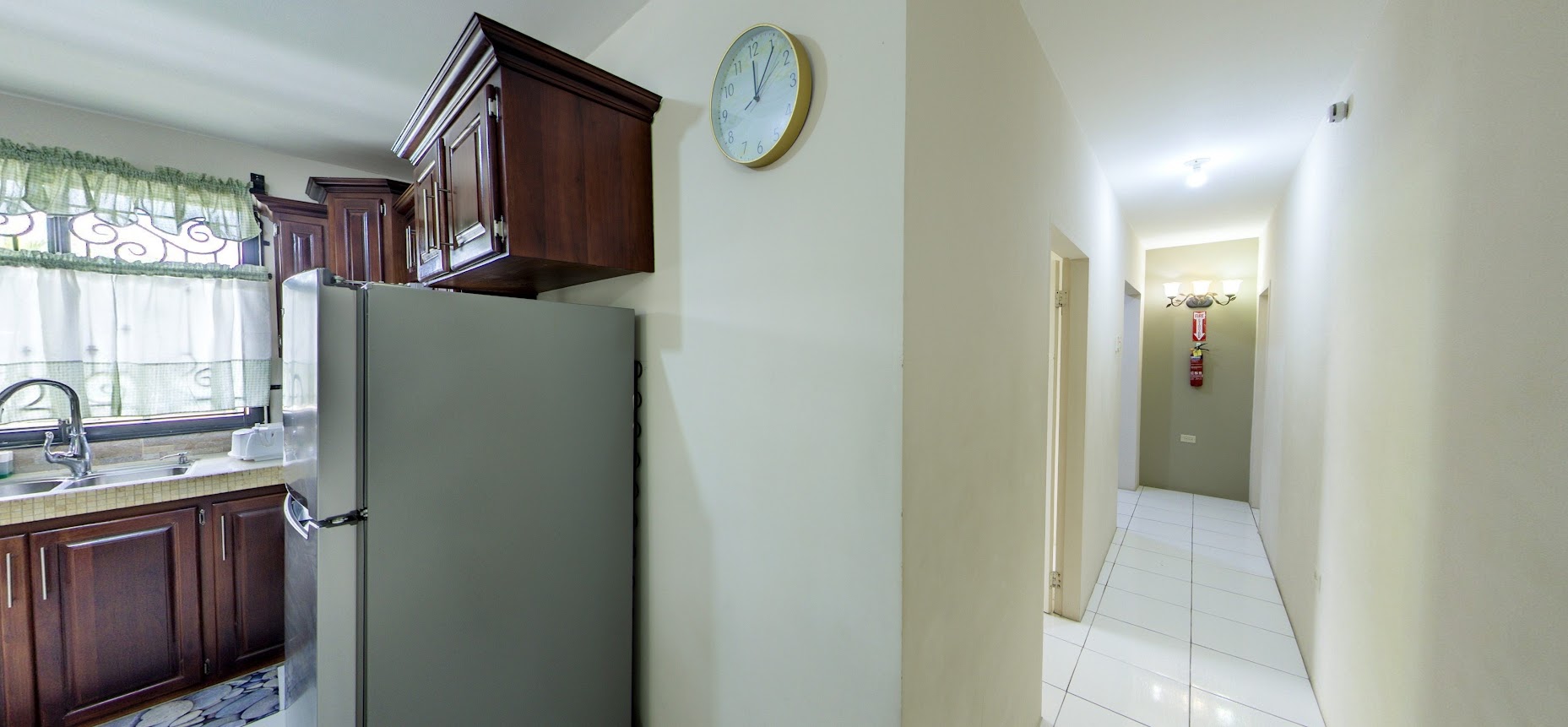 Kitchen looking down the hallway to bedrooms