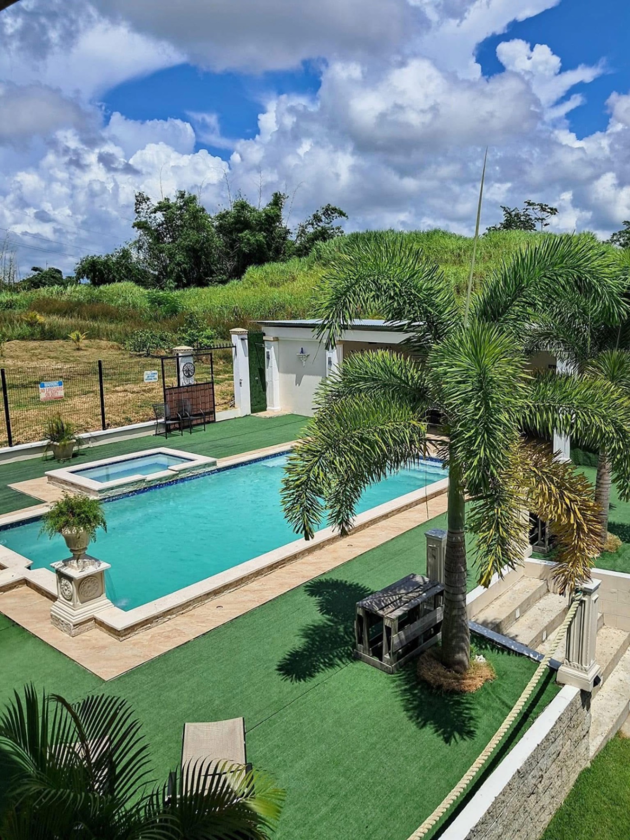 Aerial view of the pool and grounds