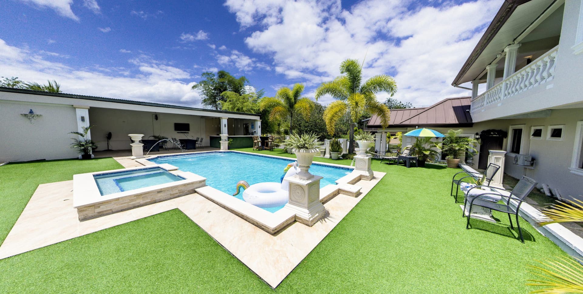 Private pool at Vintage Oaks Hideaway boutique eco-retreat in Moruga, South Trinidad, at golden hour