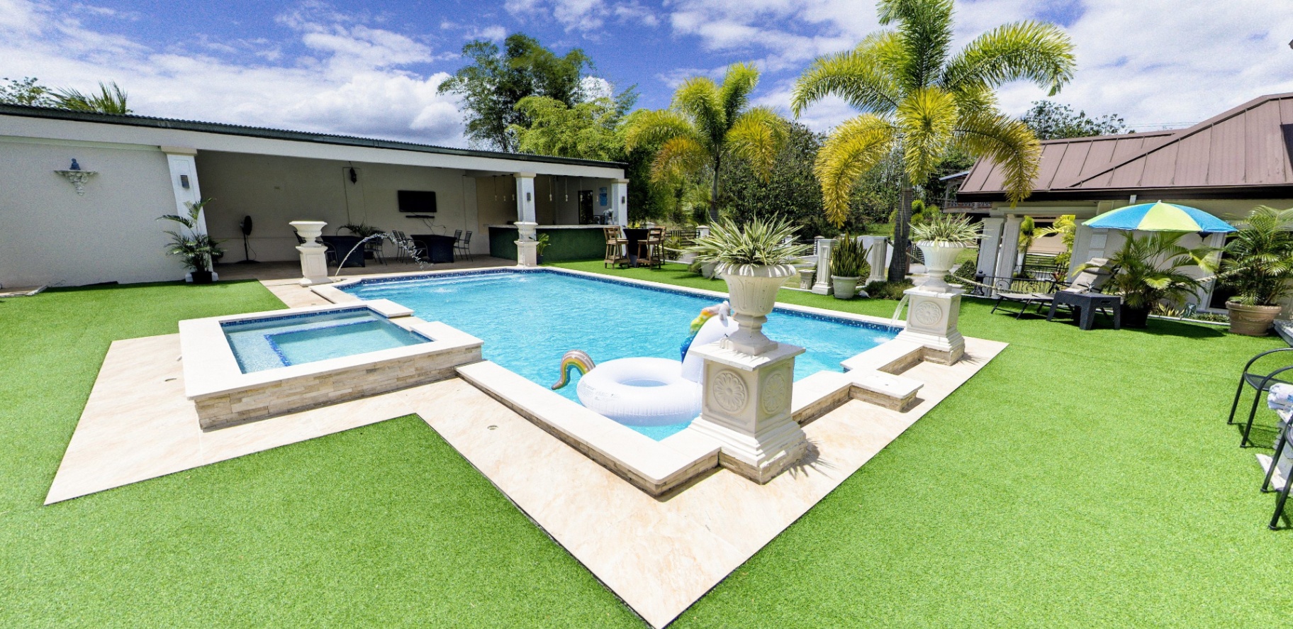 Zoomed corner view of pool and outdoor lounge
