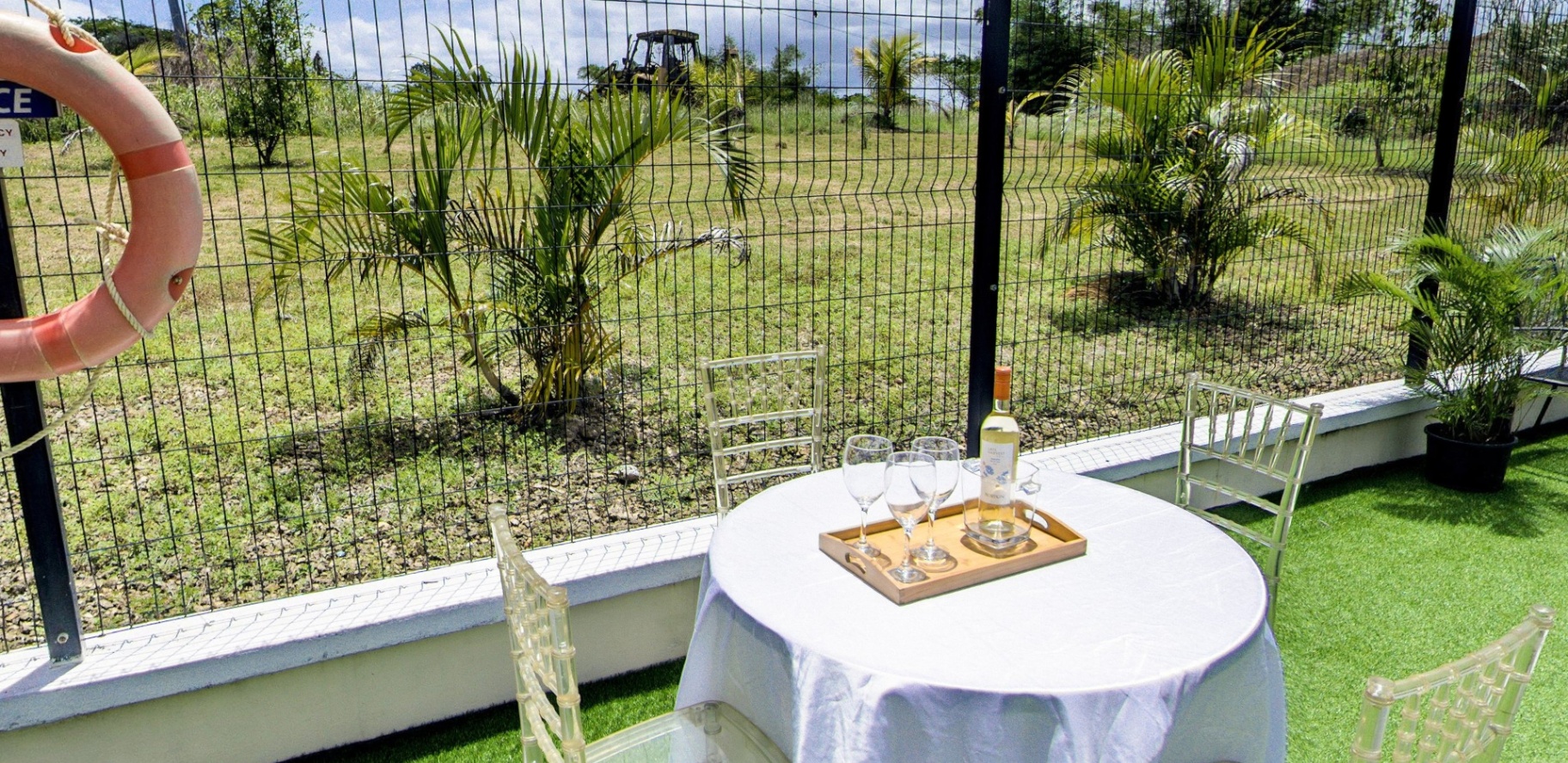 Table set for two with wine and countryside view