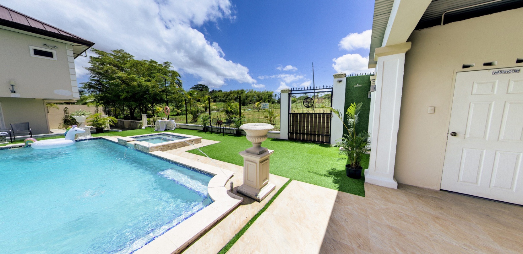 Poolside washroom and outdoor shower area