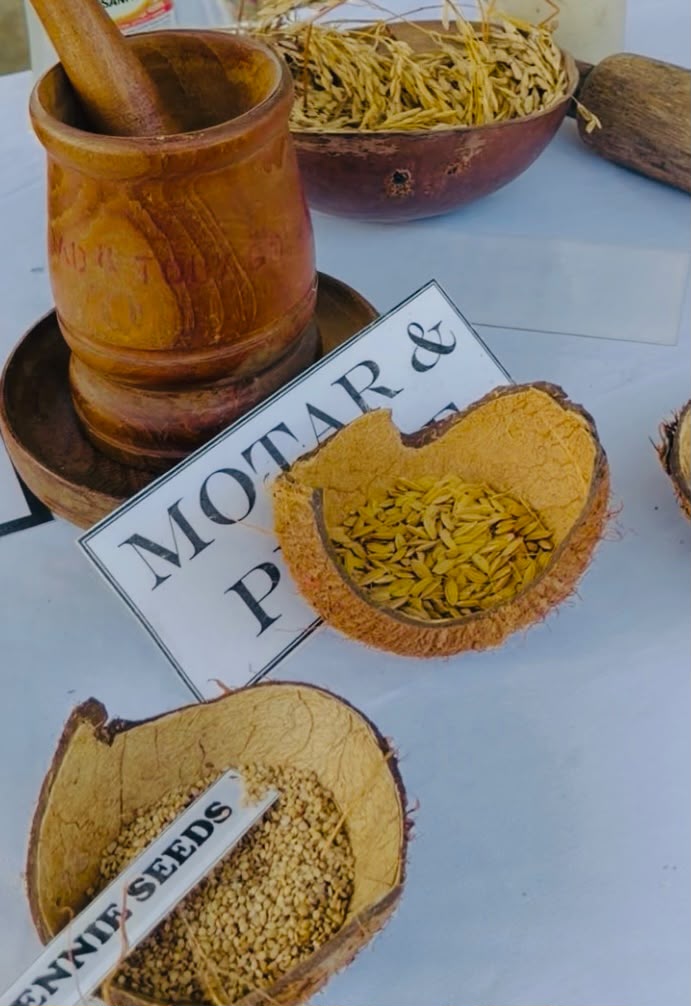 Mortar and pestle with hill rice and bennie seeds displayed at the Meriken heritage museum in Moruga