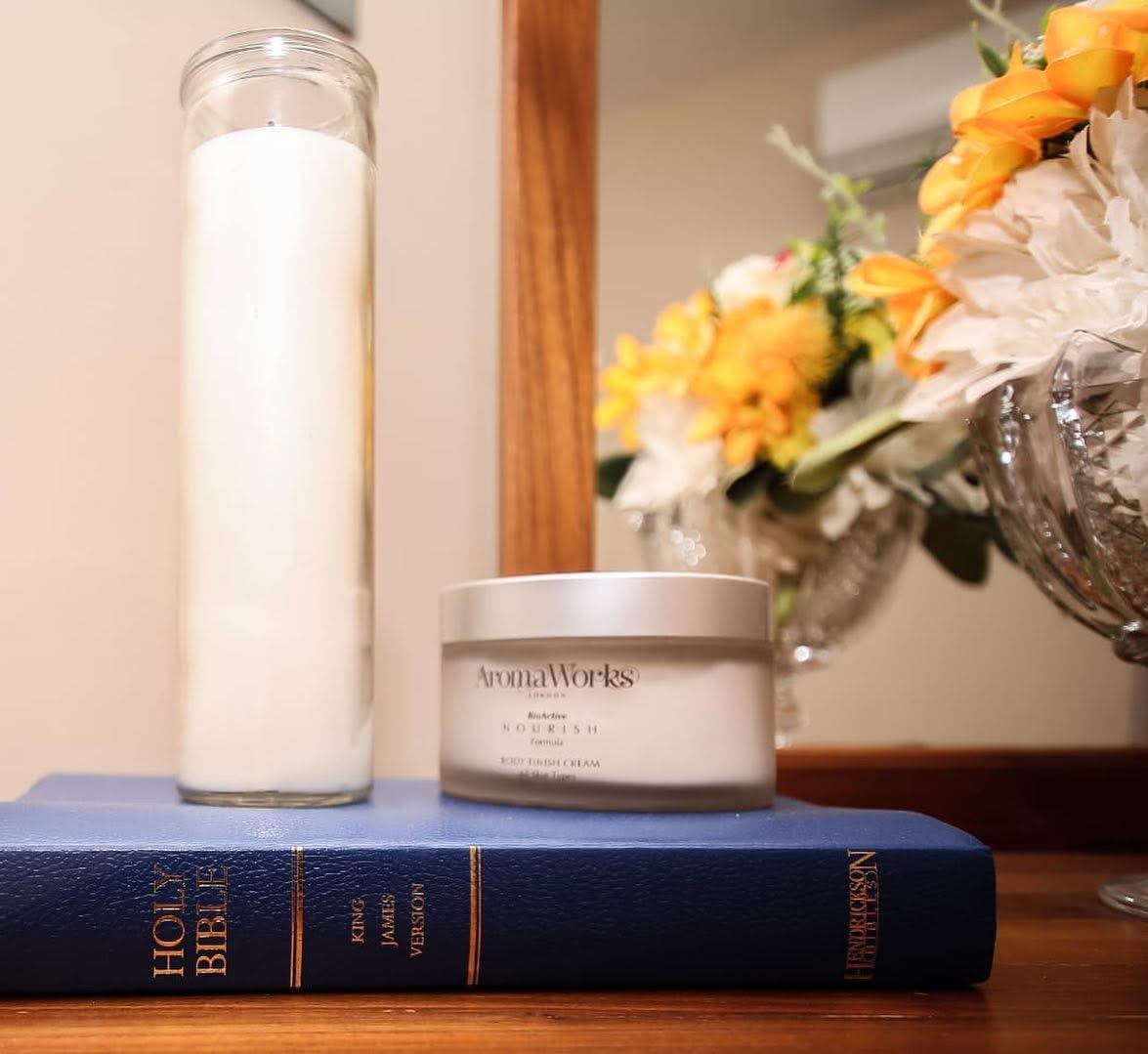 Bedside details: candle and blooms